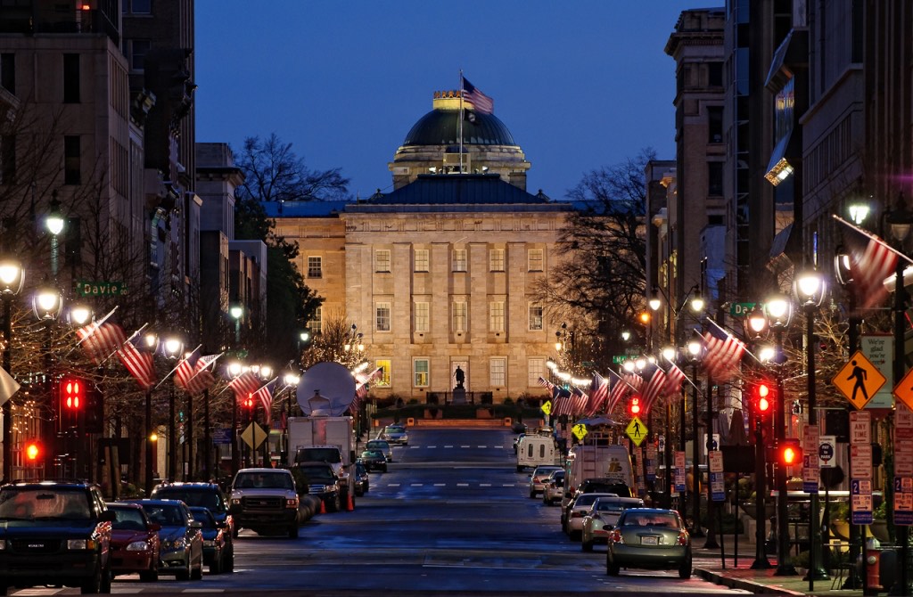 Fayetteville Street in Raleigh at dusk, looking toward the North Carolina State Capitol